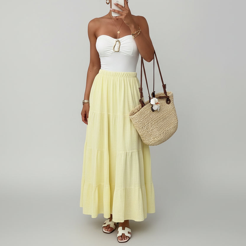 Falda midi plisada minimalista para mujer estilo elegante